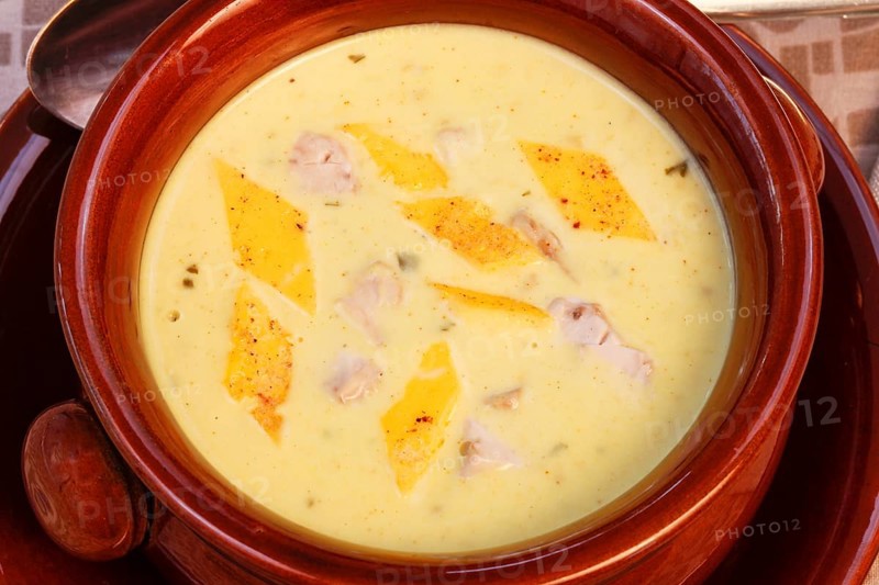 Swabian cuisine, brain soup with egg garnish, offal, calf's brain, regional, soup served in a bowl, home cooking, typical Swabian, traditional cuisine, food photography, studio, Germany, Europe