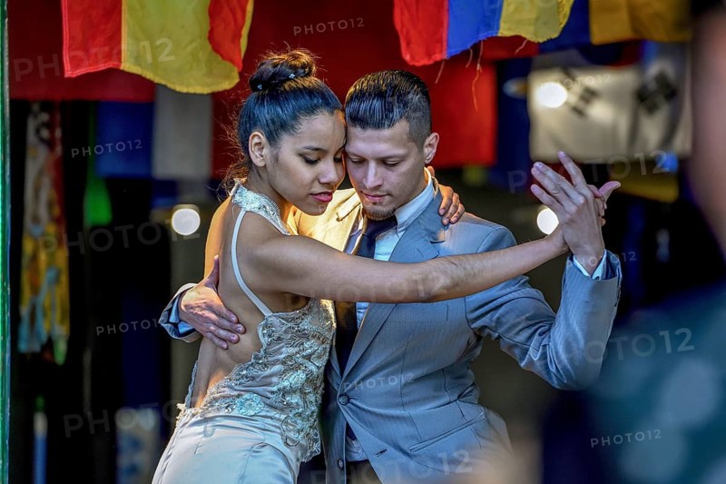 Tango dancers on the street in the port district of La Boca, Caminito, Buenos Aires, Argentina, South America