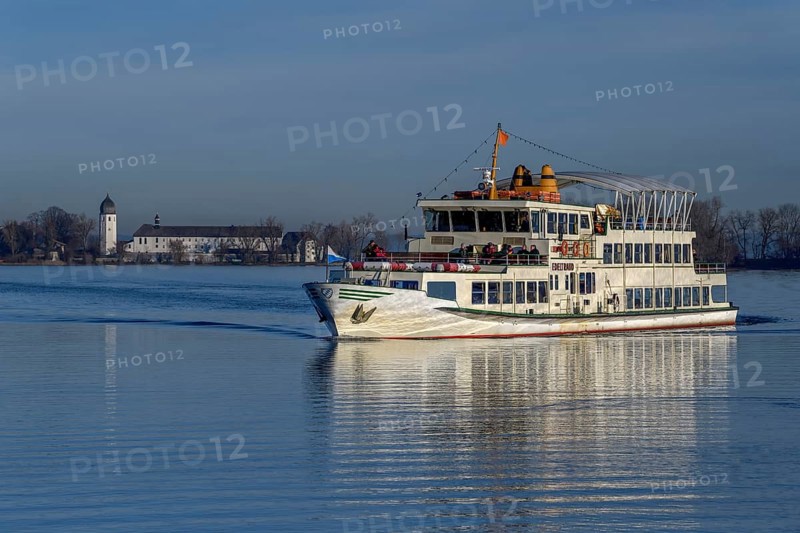 Excursion boat on the Chiemsee in winter, behind Fraueninsel, Upper Bavaria, Bavaria, Germany, Europe