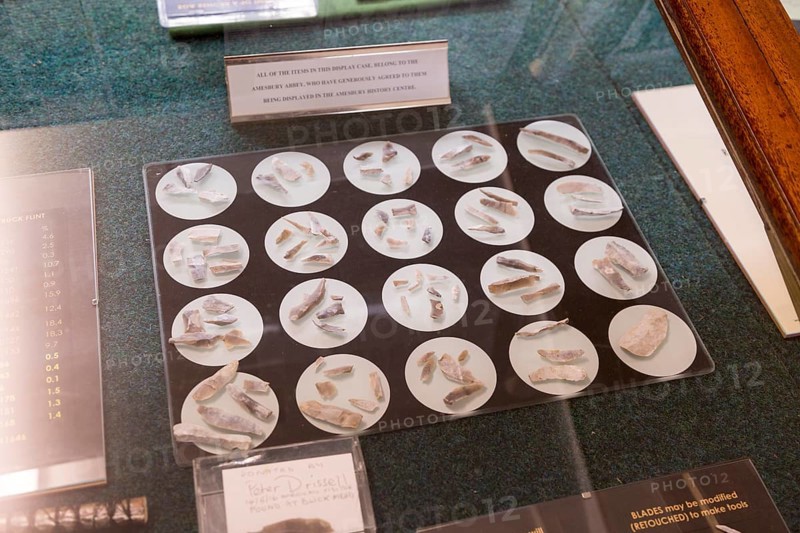 Display cases of Mesolithic Old Stone Age flint tools from Blick Mead, Amesbury History Centre, Wiltshire, England, UK