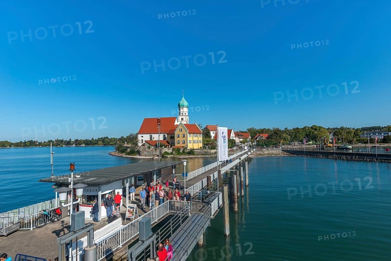 Moated castle, Lake Constance, kiosk, jetty, tourists, parish church of St George, onion dome, Bavaria, Germany, Europe