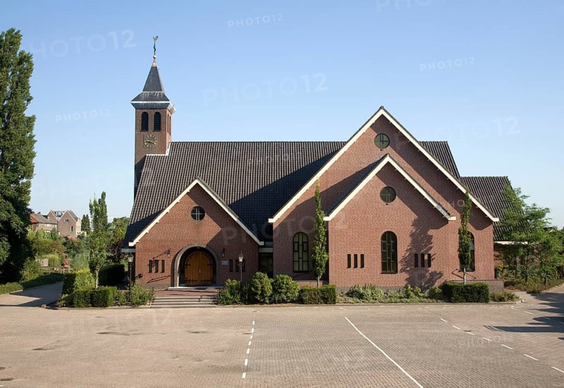 Small rural church in village of Kinderdijk Ablasserdam, near Rotterdam, Netherlands