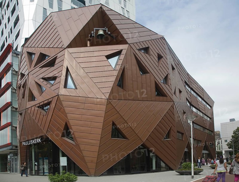 Modern architecture Nieuwe Pauluskerk, Rotterdam, Netherlands, opened June 2013 designed by British architect Will Alsop. The church is part the Calypso mixed use urban development project which includes 408 apartments, 500 covered parking spaces, and 6, 500 square meters of commercial space