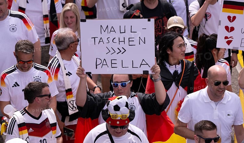 Fan march, German football fans march to the quarter-final Spain versus Germany, UEFA EURO 2024, European Championship, flags, banners, atmosphere, atmospheric, sign Maultaschen statt Paella, DFB fan club, German Football Association, B14, Cannstatter Straße, Stuttgart, Baden-Württemberg, Germany, Europe