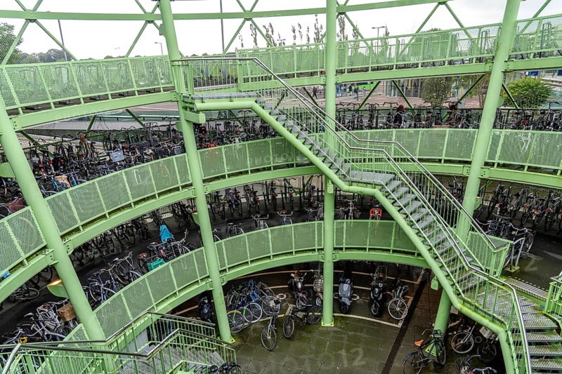 The Fiestappel, bicycle car park for over 900 bicycles, in a stylised apple shape, in Alphen aan den Rijn, directly at the railway and bus station, as well as on a central cycle path, Netherlands