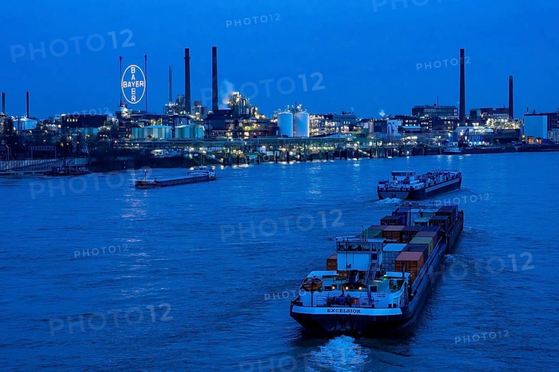 Backdrop of Chempark Leverkusen, Bayer Leverkusen, chemical park, chemical plant, river Rhine, cargo ship, Leverkusen, North Rhine-Westphalia, Germany, Europe
