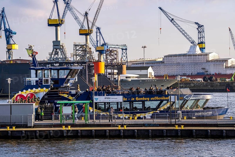 Hamburg harbour, Elbe, shipping traffic, Hadag harbour ferry Oortkaten, Altona landing stage, fish market, Blohm + Voss shipyard behind, Dock 11, Hamburg, Germany, Europe