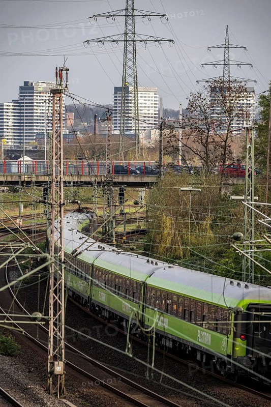 Flixtrain train on the railway line between Mülheim an der Ruhr, and Duisburg, busy railway line, for local and long-distance traffic, freight traffic, North Rhine-Westphalia, Germany, Europe