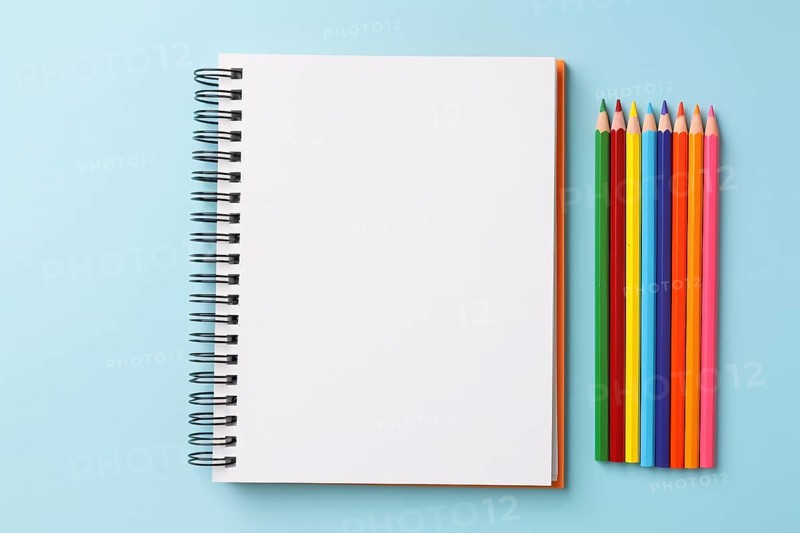 Empty blank notebook with colorful pencils. KI generiert, generiert, AI generated