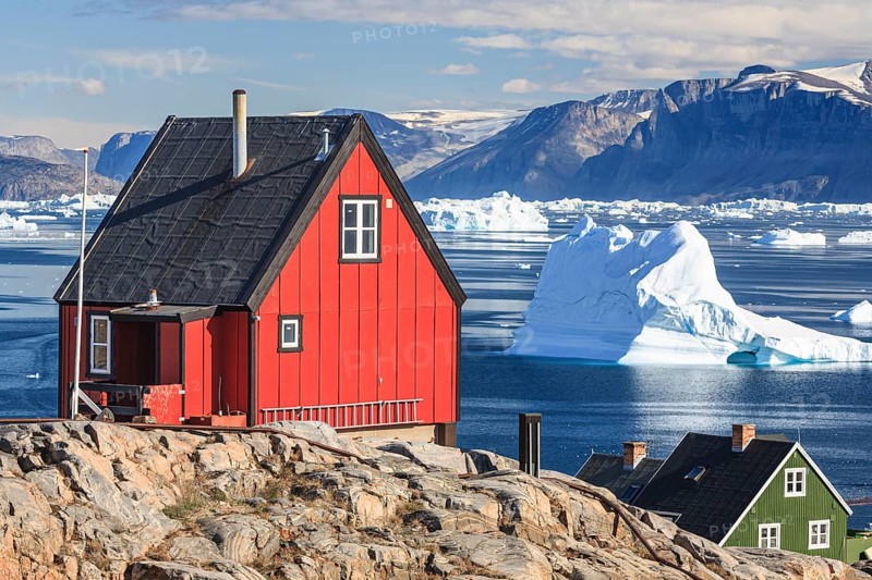 Typical Greenlandic houses in front of icebergs, Inuit settlement, summer, sunny, Uummannaq, West Greenland, Greenland, North America