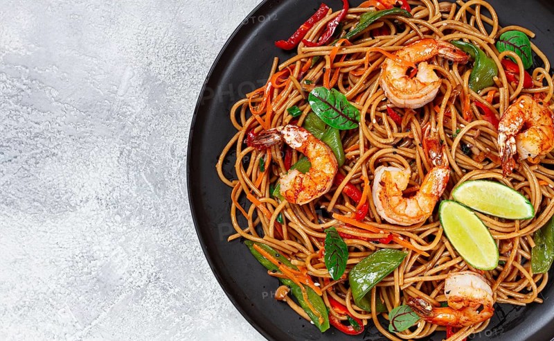 Fried udon noodles with shrimp and vegetables, Asian cuisine, homemade, no people