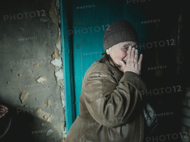 Larisa in her house in Borshchivka. The village was under Russian occupation. She hid with her granddaughter Angelina for almost six months in her house in Borshchivka, Raion Isyum, Kharkiv Oblast, Ukraine, Europe