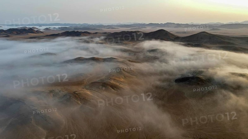Coastal fog over the desert, aerial view, Hoarusib dry river, Kaokoveld, Kunene region, Namibia, Africa