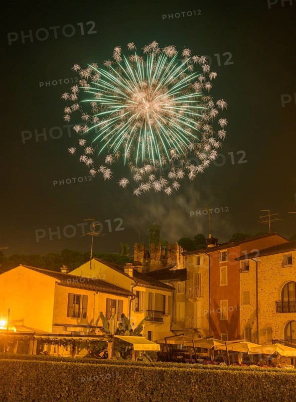 Fireworks from the Scaliger castle in the foreground Houses of, Borghetto, Valeggio sul Mincio, Province of Verona, Italy, Europe