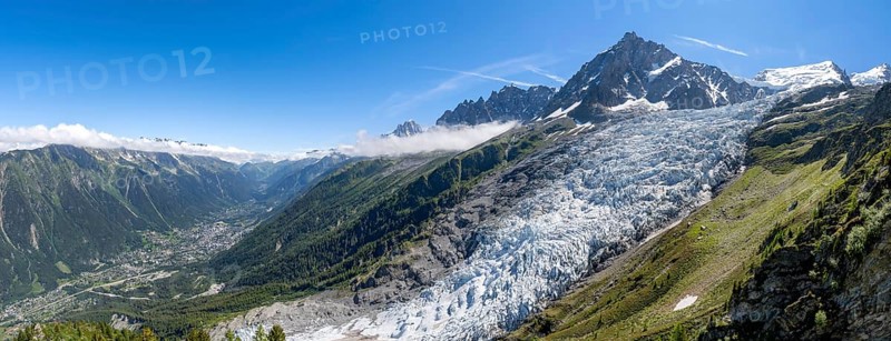 Panorama, mountain landscape with glacier Glacier des Bossons and summit of the Aiguille du Midi, view into the valley with the village of Chamonix, Chamonix, Haute-Savoie, France, Europe
