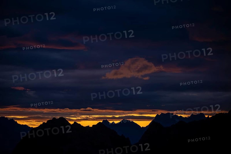 Montafon mountains with dramatic cloudy sky at sunrise, Tschagguns, Rätikon, Montafon, Vorarlberg, Austria, Europe