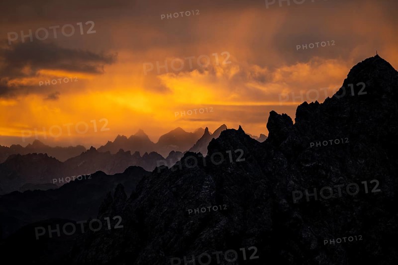 Montafon mountains with dramatic cloudy sky at sunrise, Tschagguns, Rätikon, Montafon, Vorarlberg, Austria, Europe