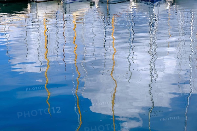 Water reflection, sailing boats in the harbour of Saint Tropez, Var, French Riviera, Provence-Alpes-Cote d'Azur, Cote d Azur, France, Europe