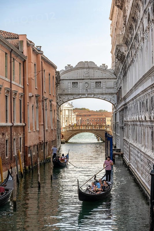 Venetian gondolas on the Rio di Palazzo canal with Bridge of Sighs, Venice, Veneto, Italy, Europe