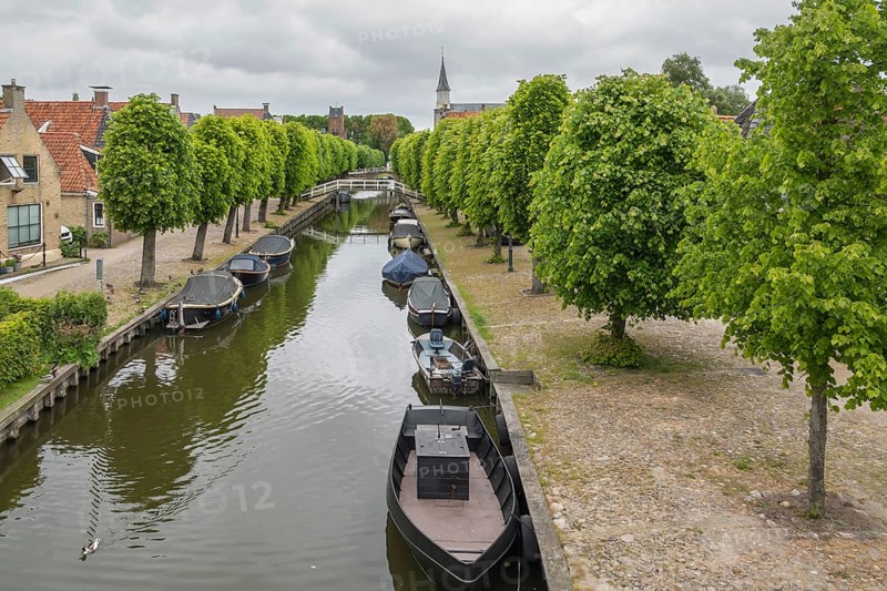 Sloten (Dutch, West Frisian Sleat) is the smallest city (with city rights) in the Netherlands and is one of the eleven Frisian cities, Sloten, province of Friesland, Netherlands