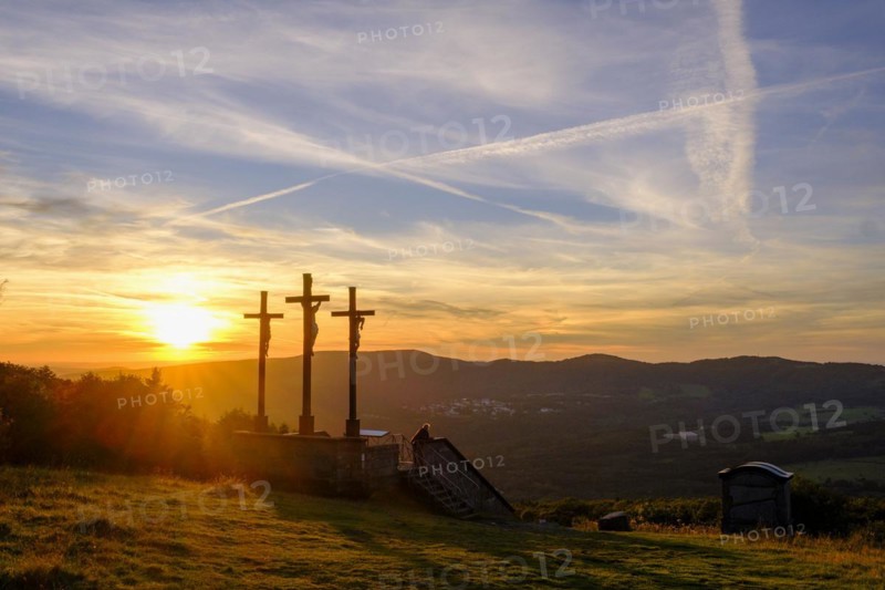 Sunset, crucifixion group, three crosses on the Kreuzberg in the Rhön, Kreuzberg near Bischofsheim, Rhön, Lower Franconia, Bavaria, Germany, Europe