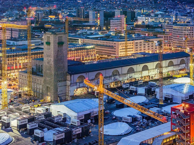 Central station, Stuttgart 21 construction site, Bonatz building and station tower. The new through station is being built here. Night shot, aerial view, Stuttgart, Baden-Württemberg, Germany, Europe