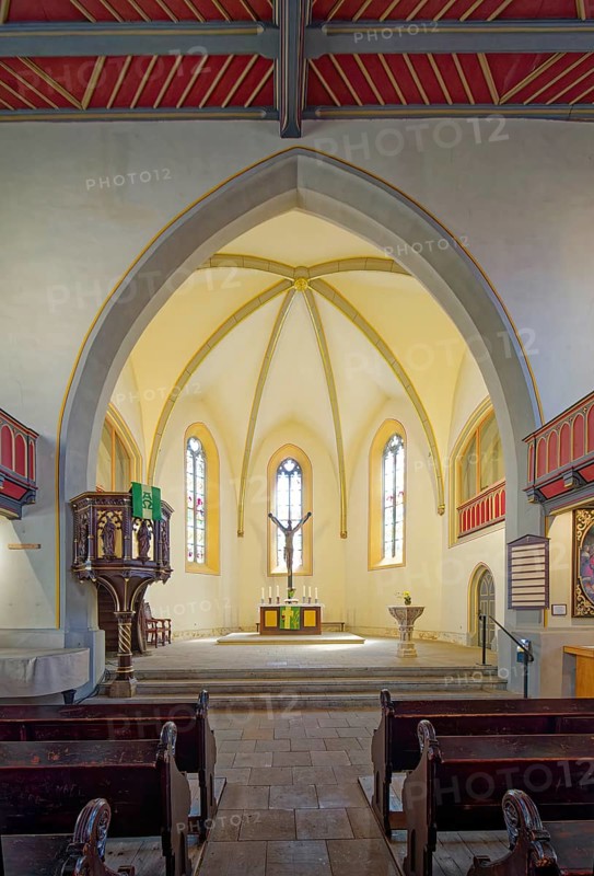 Pulpit, altar, crucifix and baptismal font, late Gothic Protestant-Lutheran town church of St Peter, interior view, market square, old town centre of Eisenberg, Saale-Holzland district, Thuringia, Germany, Europe