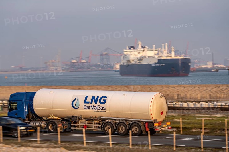 Container lorry, bringing containers to Euromax Container Terminal, the seaport of Rotterdam, Netherlands, deep-sea port Maasvlakte 2, on a man-made land area off the original coastline