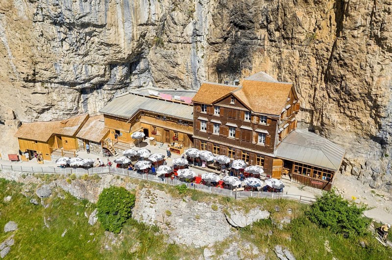Ebenalp, Guest house Aescher, Wildkirchli under the Ascher cliff, aerial view, Ebenalp, Appenzell, Switzerland, Europe