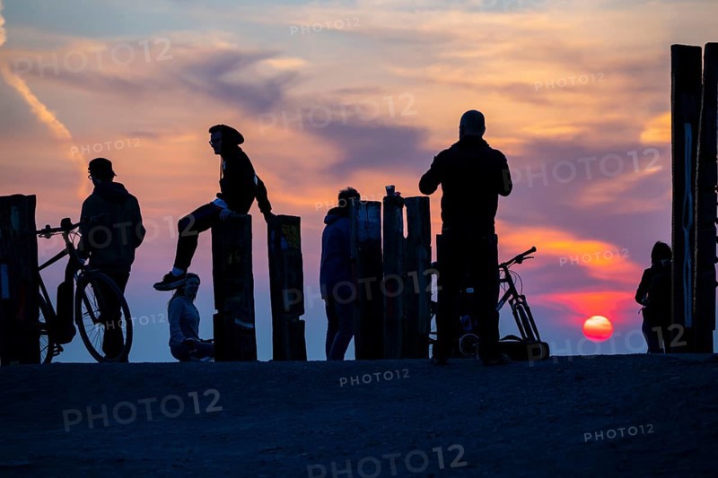 The Haniel spoil tip, 185 metre high spoil tip, at the Prosper Haniel mine, which was closed in 2019, artwork Totems by the sculptor Augustin Ibarrola, sunset, Bottrop, Germany, Europe