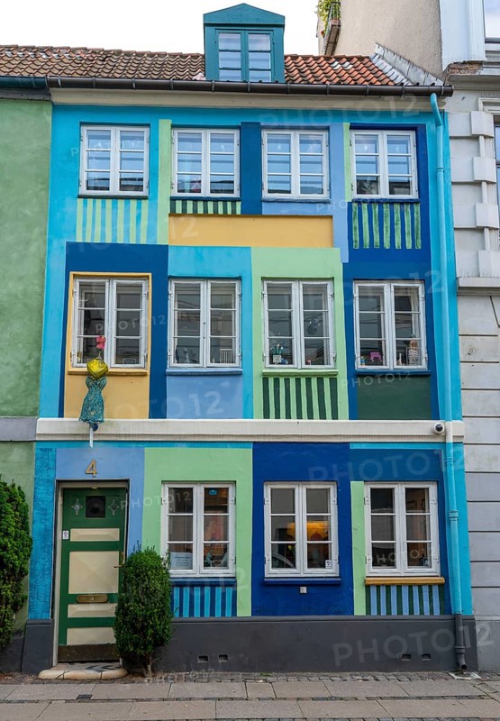 House with colourful facade in Sofiegade, Christianshavn's old district, at the same time very lively and hip neighbourhood, crossed by many canals, with shops, pubs, living space, Copenhagen, Denmark, Europe