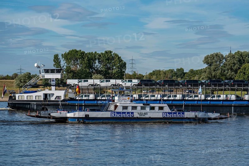 Car ferry between Duisburg-Walsum and Orsoy, vehicle transporter cargo ship Terra, of the company Mosolf, specialised service provider for the automotive industry, transports vehicles worldwide, freighter with vans on the Rhine, downstream to the south, North Rhine-Westphalia, Germany, Europe