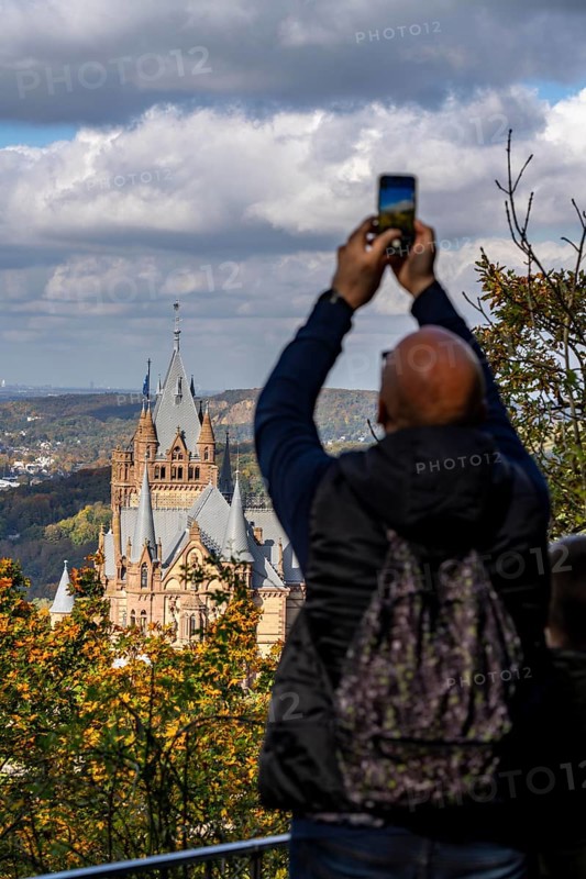 Drachenburg Castle, on the Drachenfels, a mountain in the Siebengebirge on the Rhine between Bad Honnef and Königswinter, tourist taking a mobile phone photo, North Rhine-Westphalia, Germany, Europe
