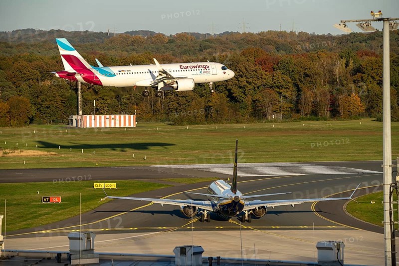 Eurowings Airbus A320neo landing at Cologne-Bonn Airport, Ryanair Boeing 737, waiting on the taxiway, in front of take-off, CGN, North Rhine-Westphalia, Germany, Europe