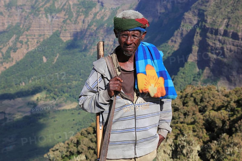 In the highlands of Abyssinia, in the Semien Mountains, landscape in the Semien Mountains National Park, guard, accompanying person, Ethiopia, Africa