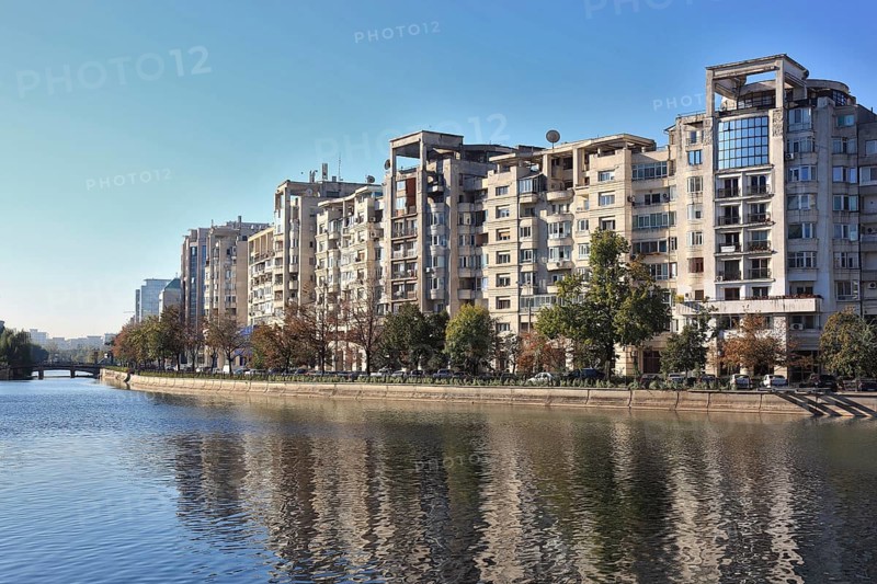 City centre, modern buildings, residential buildings, high-rise buildings at Bulevardul Unirii, at the river Dambovita, Bucharest, Romania, Europe