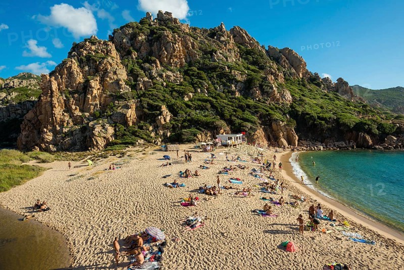 Red rocks and picturesque beach, Spiaggia di Cala li Cossi, Costa Paradiso, Sardinia, Italy, Europe