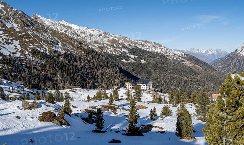 Zufallhütte mountain hut, view of the Martell Valley, snow-covered mountain landscape in winter, Ortler Alps, Vinschgau Valley, Italy, Europe