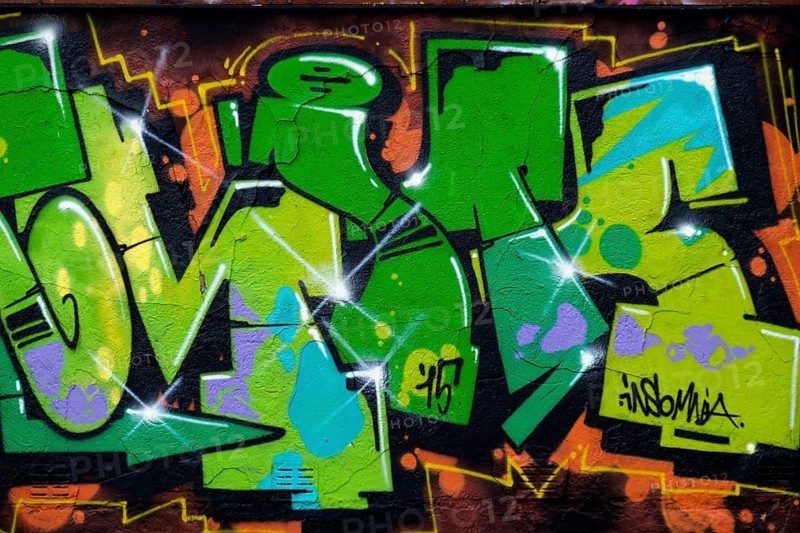 Colourful graffiti with dominant green and orange colours, Landau, Rhineland-Palatinate, Germany, Europe