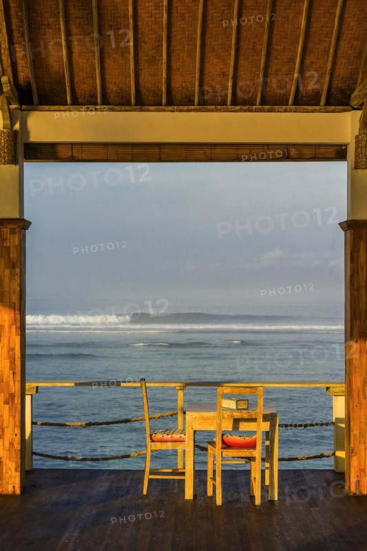 Seat with sea view at sunset, travel, holiday, tourism, breakfast, dinner, eating, dining table, outside, balcony, terrace, ocean, nice weather, summer, nobody, empty, wooden furniture, summer holiday, sun, sea, beach, seat, idyllic, idyllic, daytime, calmness, relaxation, symbolic, holiday dream dream holiday, view, horizon, enough, positive, beautiful, romantic, feel good, feeling, emotion, paradise, paradisiacal, Nuss Lembongan, Bali, Indonesia, Asia