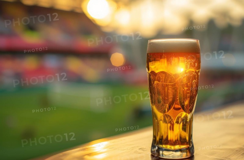 Cup of beer standing on the table ready to be consumed before the sport game, AI generated