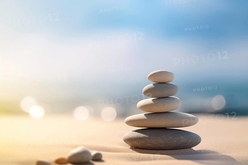 Zen stones stack on sand waves in a minimalist setting for balance and harmony. Balance, harmony, and peace of mind, wellness, meditation, and spirituality concept, AI generated