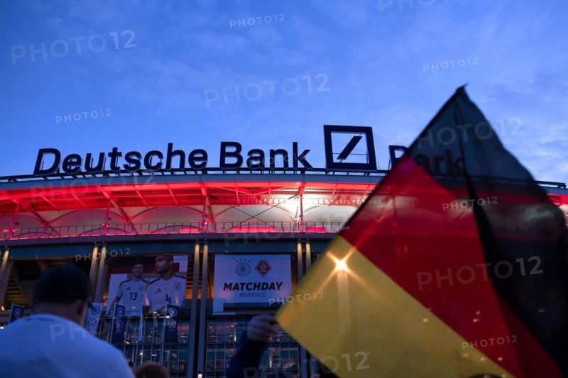 Fans, spectators streaming into the stadium, German flag, flag, international match Germany GER vs. Netherlands NED, Deutsche Bank Park, blue hour, Frankfurt am Main, Hesse, Germany, Europe