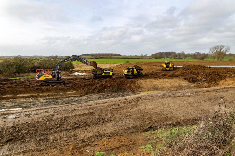 TRU PLANT hire heavy plant machinery constructing new reservoir, Shottisham, Suffolk, England, UK