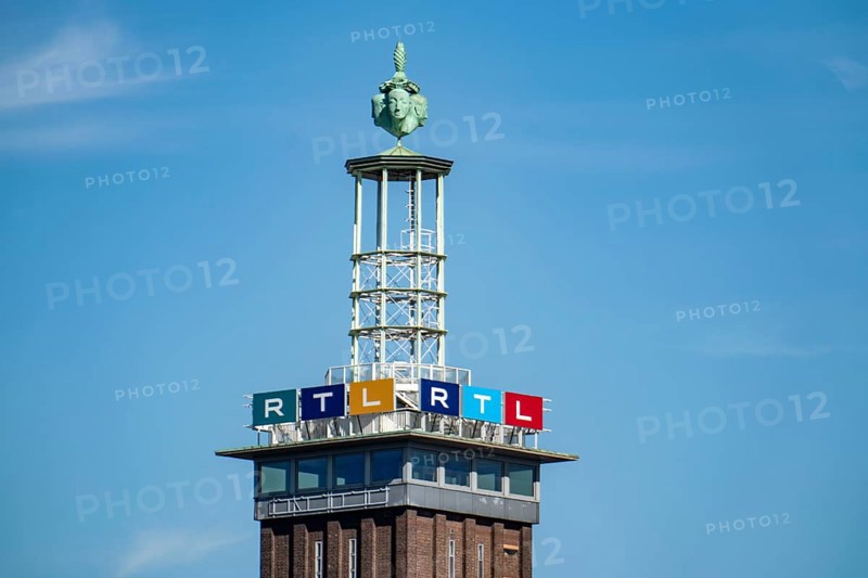 The old trade fair tower of the Cologne Exhibition Centre, with RTL logo, at the headquarters of RTL Media Group, Cologne, North Rhine-Westphalia, Germany, Europe