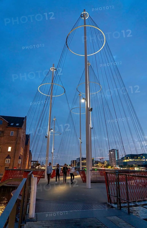 Cyclists on the Cirkelbroen cycle and pedestrian bridge, over the harbour, in the Christianshavens district, Copenhagen is considered the cycling capital of the world, 45 % of the population travel by bike, Denmark, Europe