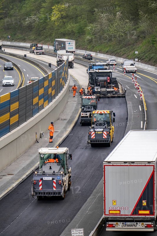 Motorway construction site on the A52 in Essen Basic refurbishment of the motorway, new noise barriers, sewerage system, new road surface, asphalting work, North Rhine-Westphalia, Germany, Europe
