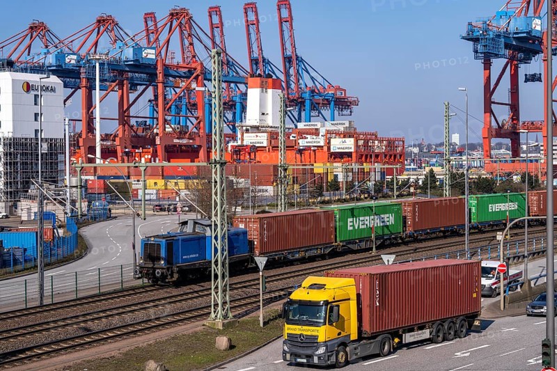 Port of Hamburg, Waltershofer Hafen, container ships, goods train with containers and container lorries bring and collect freight containers to and from HHLA Container Terminal Burchardkai, Hamburg, Germany, Europe