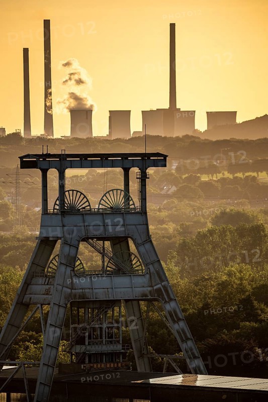 EON coal-fired power station Scholven, Gelsenkirchen, in the back, in front the double headframe of the disused Ewald mine in Herten, North Rhine-Westphalia, Germany, Europe