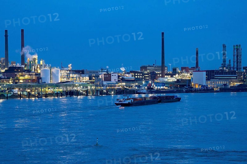 Backdrop of Chempark Leverkusen, Bayer Leverkusen, chemical park, chemical plant, river Rhine, cargo ship, Leverkusen, North Rhine-Westphalia, Germany, Europe